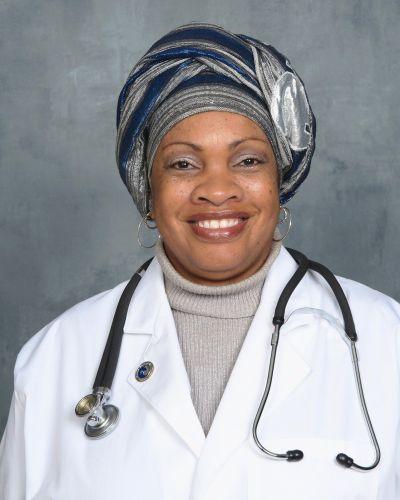 Portrait of SHERLYNN WALKER-SHAKIR,  PSY.D., DACM, MA, MSTOM, LAc.
